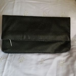 Sold. Delman black clutch